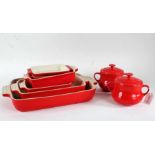 Collection of Le Creuset, to include two pots and covers, a large cooking dish and three smaller,