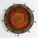 Novelty brass photograph frame, in the form of a ships wheel, with teak surround, 18.5cm diameter