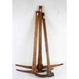 Two wooden handled pickaxes and a hoe (3)