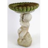 Concrete bird bath with figural base, 58cm tall