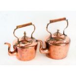 Two large Victorian copper kettles, the largest 32cm tall (2)