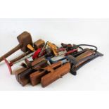 Collection of various tools, to include wooden moulding planes, wooden mallets, Ixion hand drill,