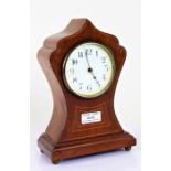 Edwardian mahogany mantel clock, of shaped form with boxwood inlay, white enamel dial with arabic