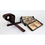 Wooden stereoscopic viewer, with a small collection of cards