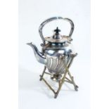 Silver plated tea kettle and stand, the kettle with scroll handle and gadrooned lower section the