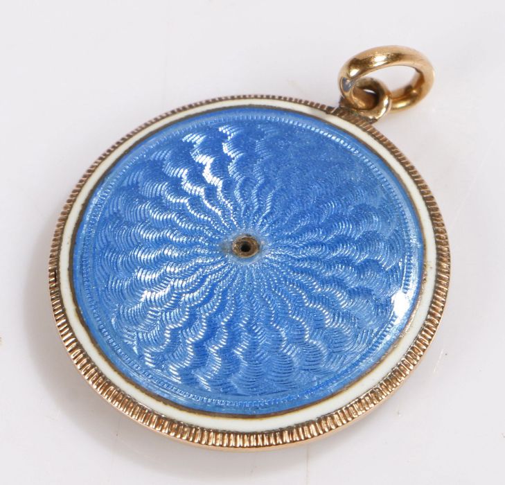 Gold coloured metal blue enamel pendant, the wavy blue enamel back with white border, the reverse - Image 2 of 2