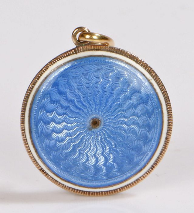 Gold coloured metal blue enamel pendant, the wavy blue enamel back with white border, the reverse