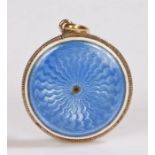 Gold coloured metal blue enamel pendant, the wavy blue enamel back with white border, the reverse