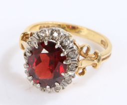 18 carat gold synthetic ruby and diamond set ring, with a central synthetic ruby and diamond