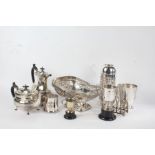 Silver plated ware to include tea and coffee pot, wine bottle holder, pierced basket with swing