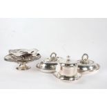 Silver plated ware, to include Elkington biscuit barrel, two oval tureens and covers, two cake