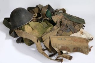 Collection of British webbing equipment, belts, gaiters, pouch, together with a British Mk IV Helmet