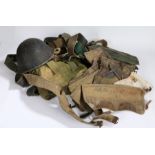 Collection of British webbing equipment, belts, gaiters, pouch, together with a British Mk IV Helmet