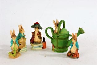 Five 'The World of Beatrix Potter' figures, to include Peter Rabbit with Watering Can Trinket Box