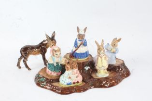 Beswick pottery Tree Stump stand, together with three Beswick and two Royal Doulton Beatrix Potter