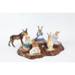 Beswick pottery Tree Stump stand, together with three Beswick and two Royal Doulton Beatrix Potter