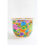 Chinese ceramic planter, decorated with colourful flowers on a yellow ground, 27cm diameter x 20.5cm