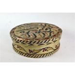 Middle Eastern wooden and painted box, of circular form, the lid with Islamic script,