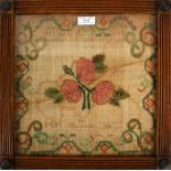 George III needlework sampler, named to Mary Huteson and dated 1818, centred with three roses,