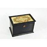 Unusual 19th century toleware tea caddy, the hinged lid with a glass topped gilded motif with bright