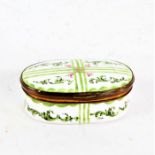 18th century South Staffordshire enamel snuff box, of oval form, painted with green leaves on a