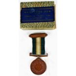 1920's Dux educational medal, named to P.M. Nunn, with green ribbon, dated 1929-30