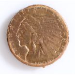 United States five dollar gold coin 1909, with eagle to one side and American Indian profile bust