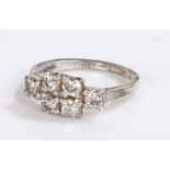 Indian white metal diamond set ring, with six round cut diamonds to the head, 2.8 grams, ring size