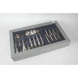 Part canteen of Community table cutlery, with foliate decorated handles, together with six non-