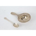 Chinese white metal tea strainer with embossed foliate decorated circular bowl and handle, stamped