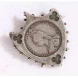 White metal brooch of shield form set with a Victorian coin to the centre dated 1887, the mount