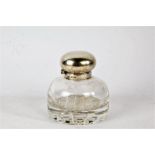 Edward VII silver mounted clear glass inkwell, the domed hinged cover above a clear glass inkwell
