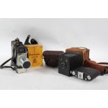 Collection of cameras, to include a Zeiss Ikon Derval folding camera, Bell & Howell Marksman cine