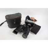 Yahsica Minister camera body with a Yashinon f/2.8 45mm lens, Vanguard Orros binoculars, and a