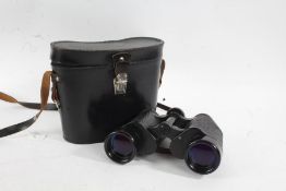 20th Century pair of Russian binoculars, marked 12 x 40 above made in USSR, housed in a leather case