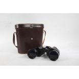 Pair of Concord binoculars, 10x50 Field 5°, with leather case