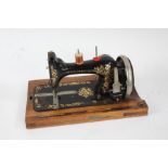 Reliance foreign cased sewing machine, with Bentalls of Kingston-On-Thamels label