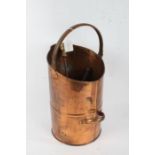 Copper coal scuttle and fire implements