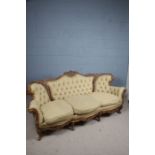 French suite, to include the settee with C scroll back and flowers caps, together with a