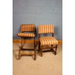 Pair of 18th walnut century chairs, with striped upholstery raised on barley twist legs (one chair