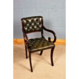 William IV style elbow chair, with green buttoned leatherette back and seat, reeded scrolled arms,