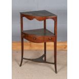 George III mahogany corner washstand, with wavy frieze above an open recess and central plateau with
