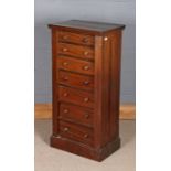 Victorian mahogany wellington chest, the seven graduated drawers with turned handles and side