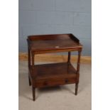 Victorian mahogany washstand, the three-quarter raised back above an open recess and central drawer,