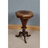 Victorian walnut trumpet table, the octagonal top raised on an octagonal tapering stem and scroll