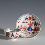 Lowestoft Redgrave style porcelain tea bowl and saucer decorated in the dolls house pattern,