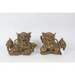 Pair of 20th century Chinese brass dog of foo, each approx. 17cm wide (2)