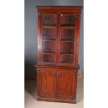 Victorian mahogany bookcase by W. Priest 17 & 24 Water St Blackfriars, the swept pediment above