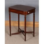 Victorian style mahogany sewing table, with hinged lid, raised on tuned legs united by curved