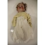 Simon & Halbig Germany bisque and composition doll, numbered 126 to the back of the neck, 47cm high